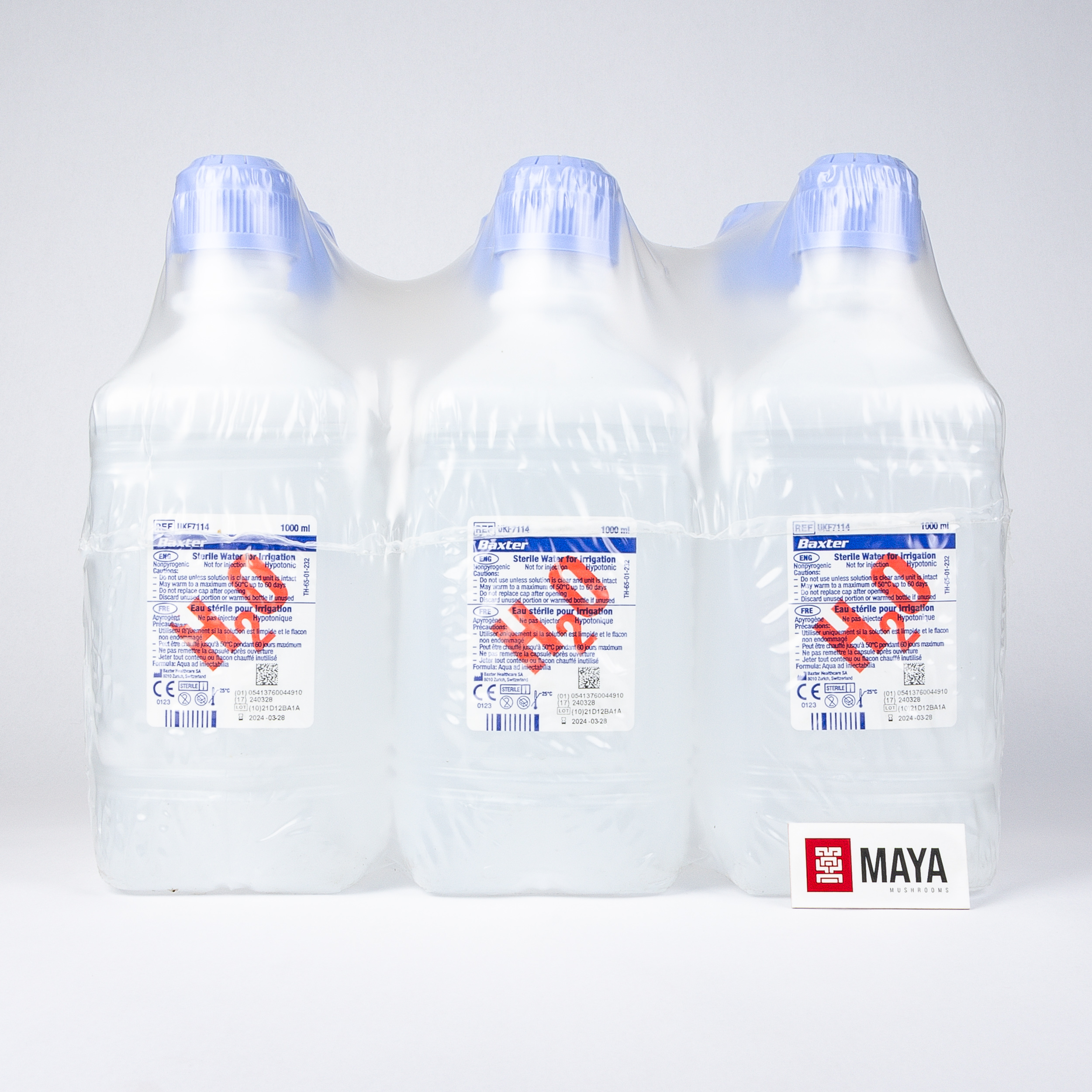Baxter Sterile Distilled Water 1 litre, 6 pack - Face on, straight